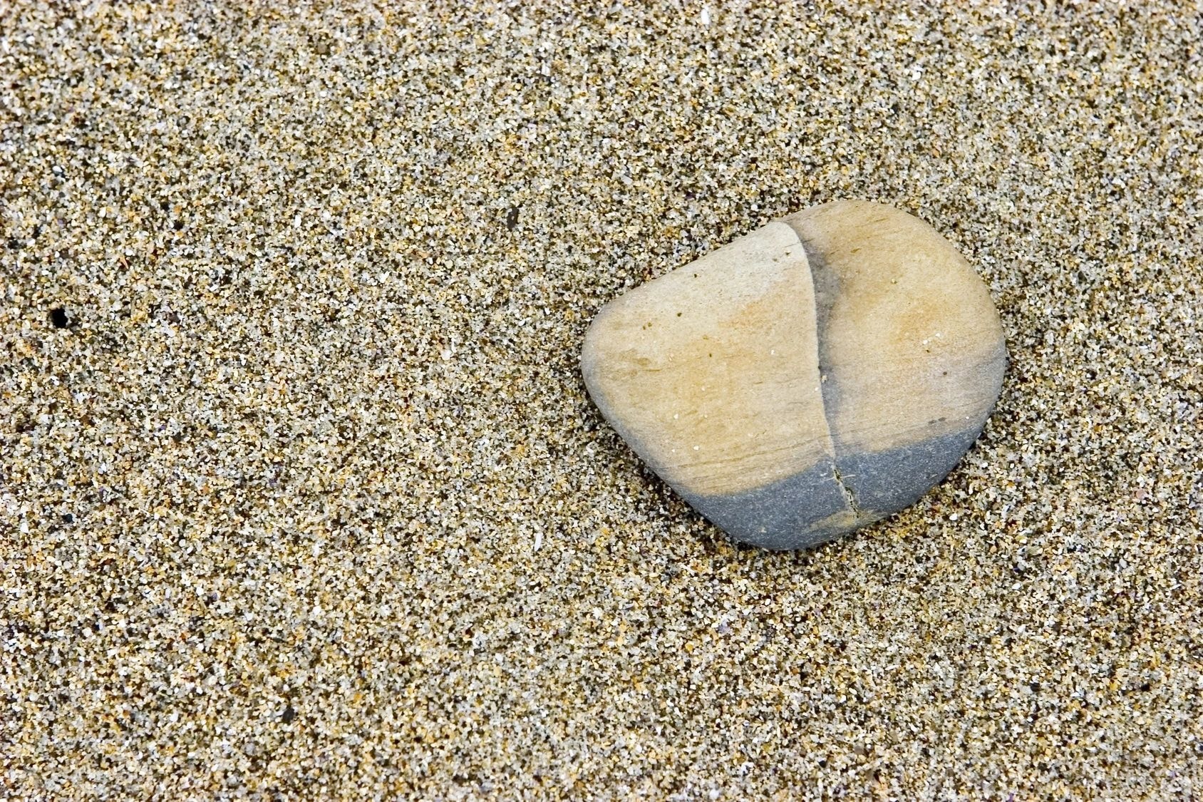 Disc-shaped stone on the beach that inspired the Vortex Series
